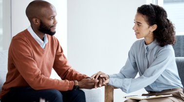 two persons talking